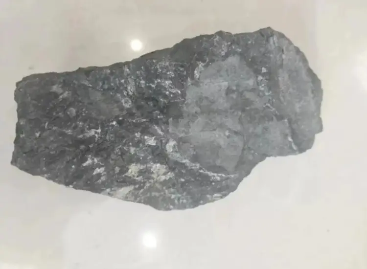 Ensayo de flotación de mineral de molibdeno